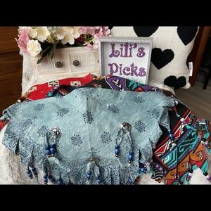 S O L D of scarfs with beads.